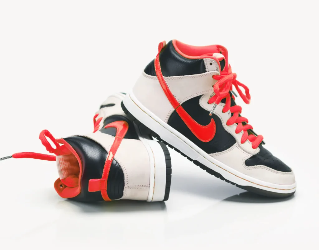 a pair of black and red sneakers