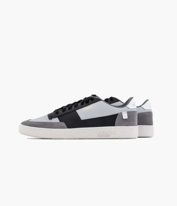 a pair of grey and white shoes