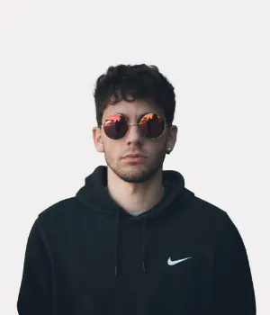 a man wearing sunglasses and a sweatshirt